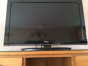 Toshiba 35" TV w/ console cables and stand