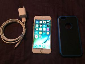 White/gold IPhone 6 with case and charger
