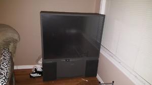 2 FREE rear projection tvs