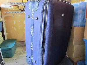 2 rolling suitcases your choice $5 each