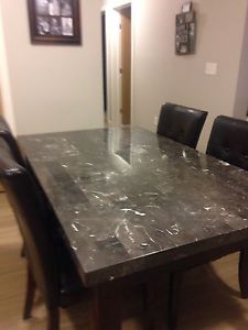 Dining table and 4 leather chairs