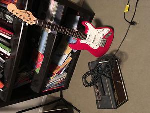 Kids fender electric guitar and small amp and lead