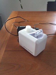Portable Humidifier - uses water bottles