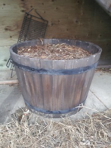 large wooden plant barrel