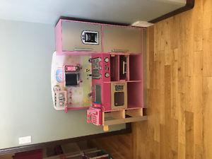 Adorable pink wood kitchen as is