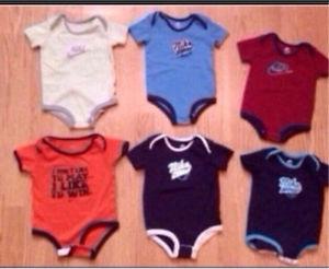 Lot of 9 month brand new Nike onesies