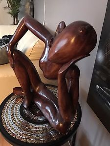 Stained wood ornamental figure
