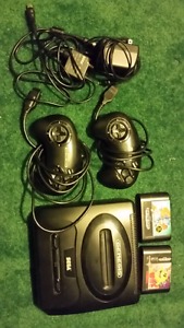 Vintage Sega Genesis Console with Controllers and Games