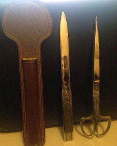 Vintage scissors and letter opener in sheath