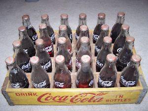  full capped coca cola,coke bottles, garage find. pepsi
