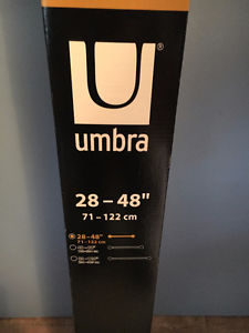 2 Umbra short adjustable curtain rods