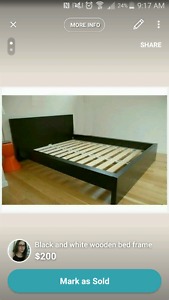 Black wooden double bed frame