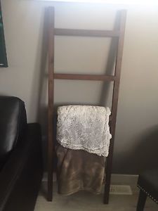 Brown wood throw ladder