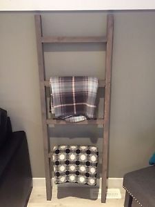 Grey finished wood throw ladder