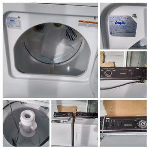 Inglis Topload Washer and Frontload Dryer, white in colour,