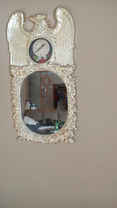 Mirror with the clock