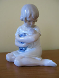 Royal Copenhagen Porcelain Figurine - "Girl With Doll”
