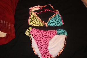 Selling brand new roxy youth bathing suit