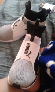 White & black puma shoes