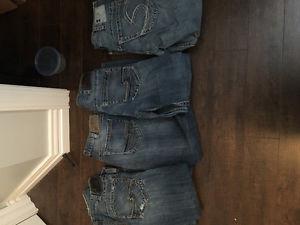 4 pairs of men's silver jeans size 