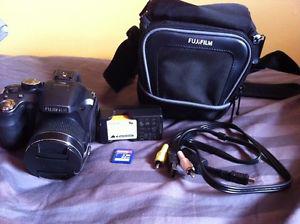 FUJIFILM camera & 32gb SDHC card.