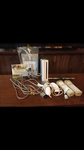 NINTENDO WII W/ GAMES AND ACCESSORIES