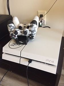 PlayStation 4 W/ 22 games + 2 Controllers
