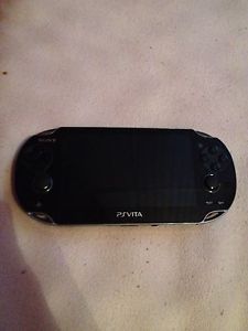 Ps vita, with games and case