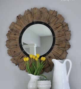Round wood sunburst mirror
