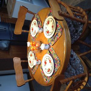Solid oak round table and four chairs
