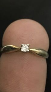 Lady's gold diamond ring. Stamped 10k.