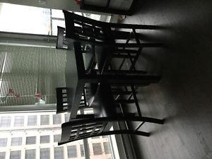 Solid wood dining table with four chairs