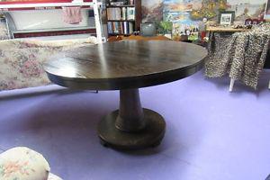 solid wood table with pedestal foot