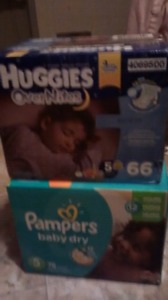 2 unopened boxes of diapers