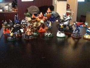 23 Skylanders figures with 2 cordless portails for sale