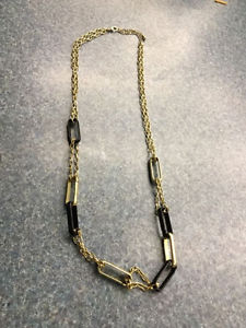 Black and gold tone necklace