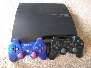 PS3 with bunch of games and 2 controllers