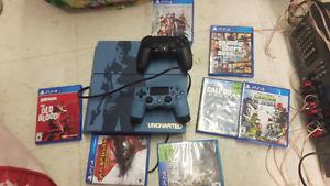 PS4 with cords, 6 or so games in exc. Cond. W/2 controllers