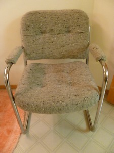 Selling grey material chair with chrome frame