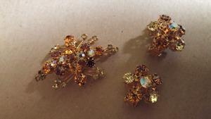 Vintage broach and clip on earrings.