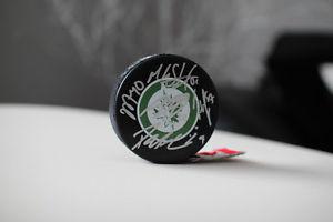 Winnipeg Jet Signed puck by Patrick Laine and other team
