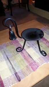 Wrought iron candle holder with snuffer