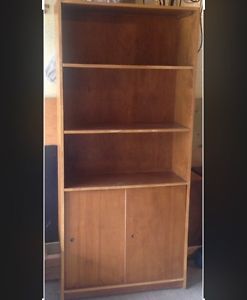 wood bookcase w/ sliding doors