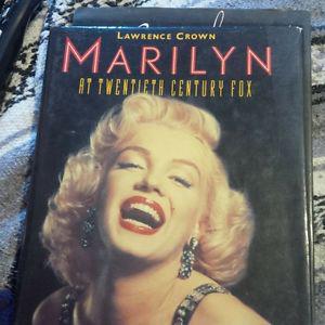 2 Marilyn Monroe hardcover books.