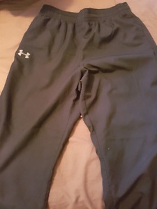 2 pairs of under armour pants size Large.