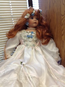 Beautifully dressed collectable Doll