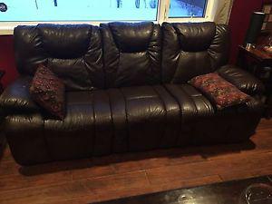 Leather couch and loveseat - with built -in recliners