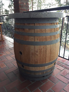 OUTDOOR HIGH TOP WINE BARRELL TABLE AND 2 WICKER BISTRO