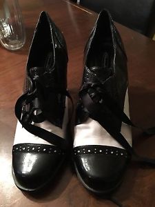 Old fashioned style black and white heels for sale