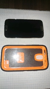 Samsung Galaxy S4 with otterbox defender and charger